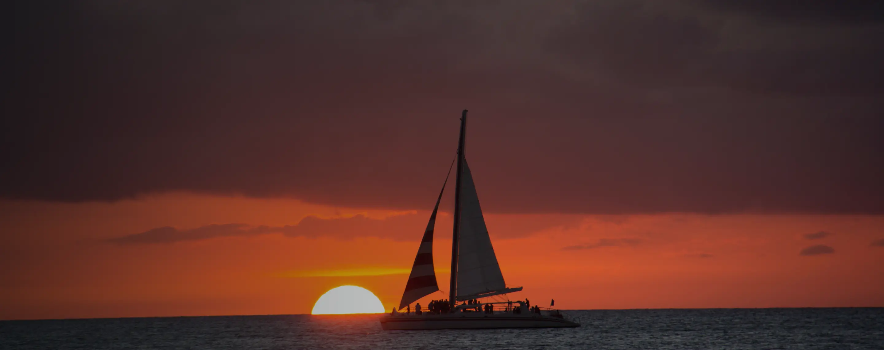 yacht sailing in the sunset